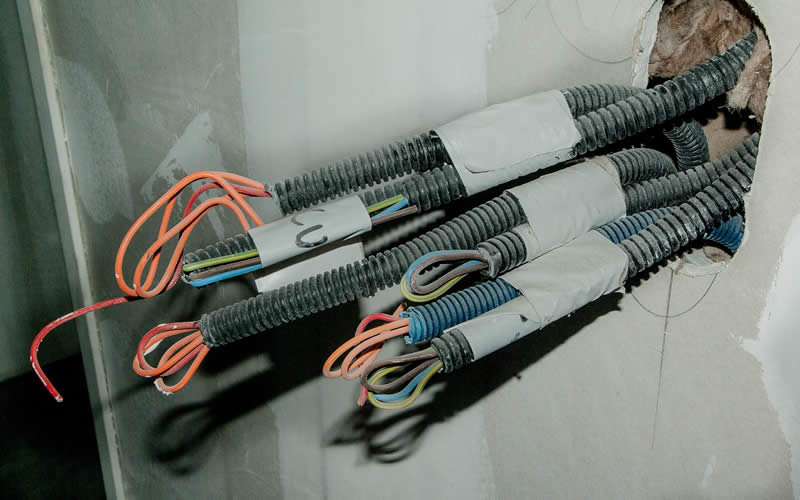 Domestic Electricians rewiring cables